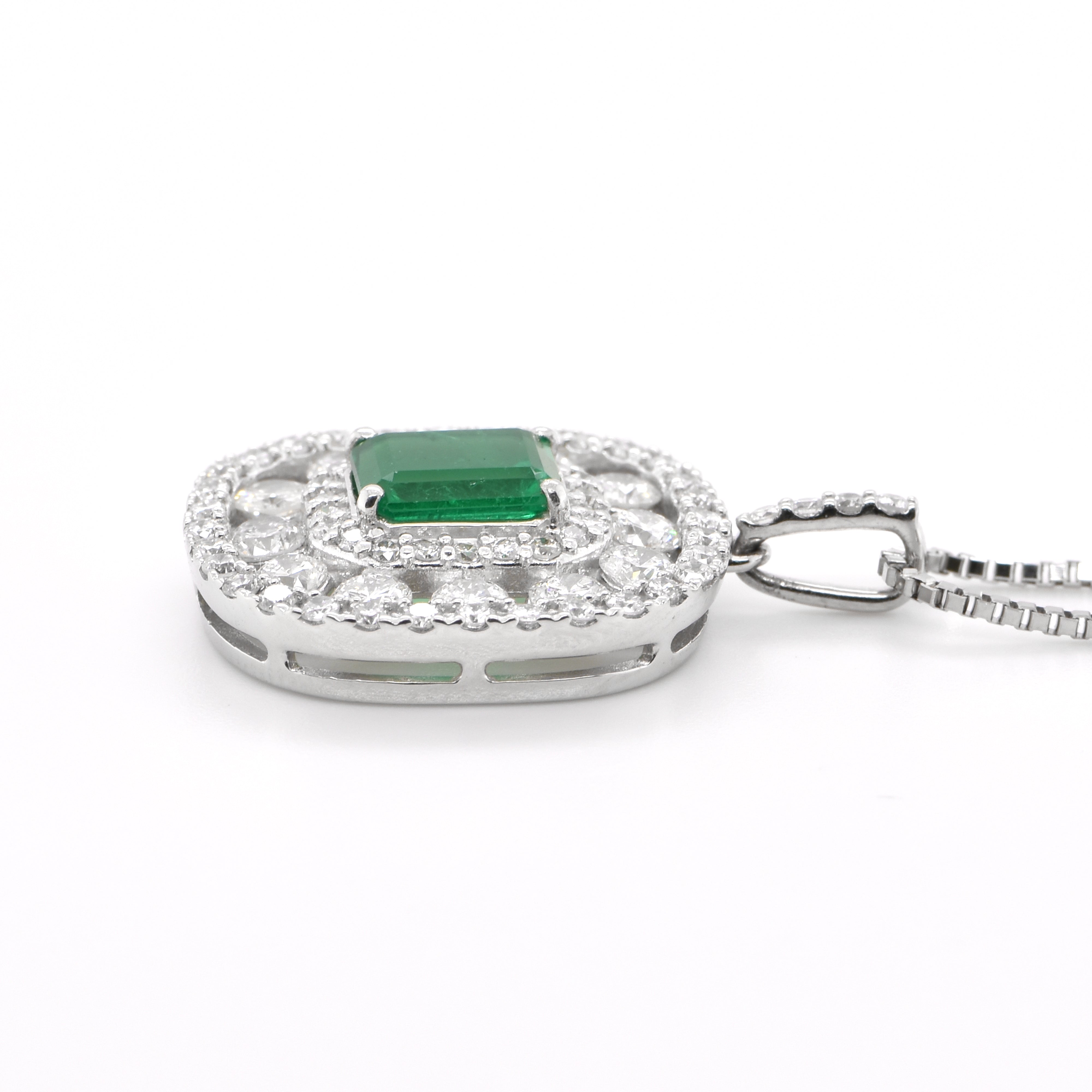 0.92 Carat Natural Emerald and Diamond Pendant set in Platinum